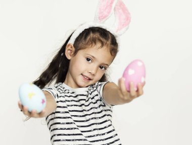 cute little girl with easter eggs