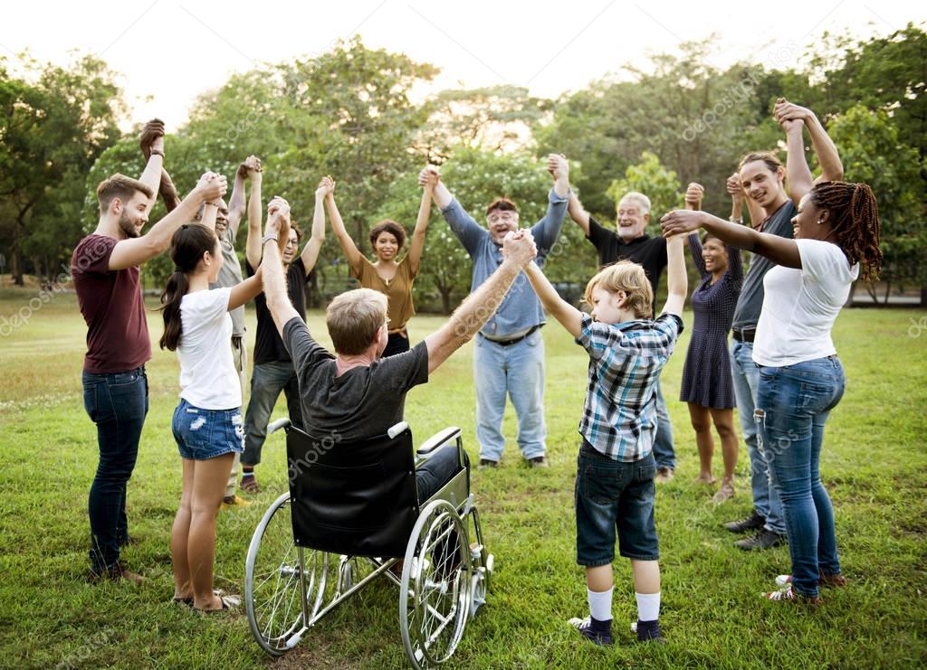 people holding hands together