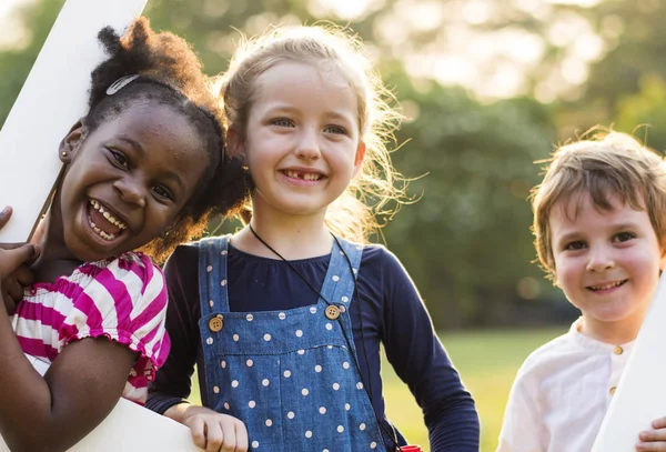 Kindergarten kids playing on playground — Stock Photo, Image