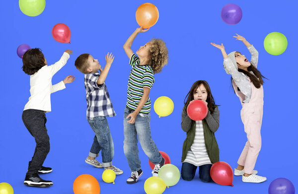 Children Playing with Balloons