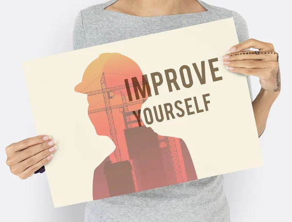 Woman holding paper placard — Stock Photo, Image