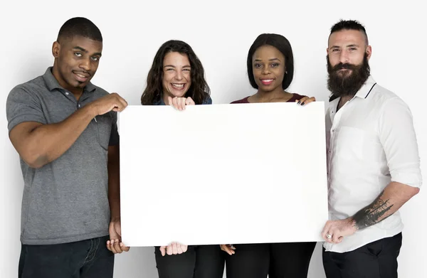 Pessoas segurando cartaz — Fotografia de Stock