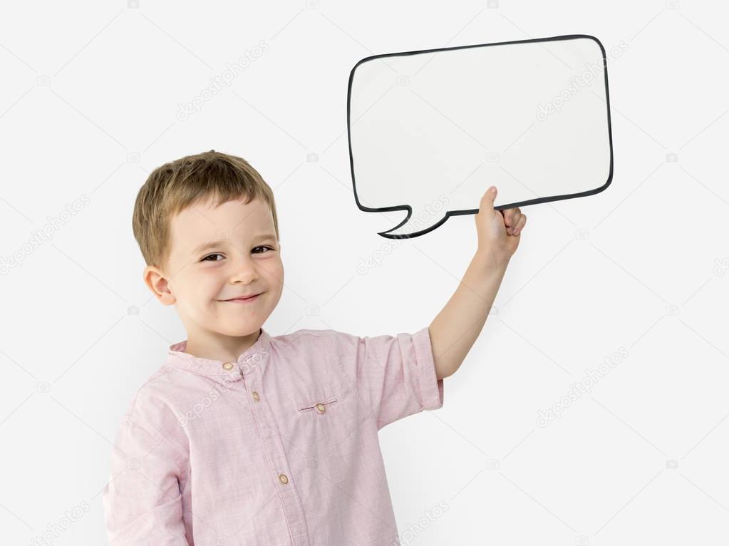 boy holding paper speech bubble