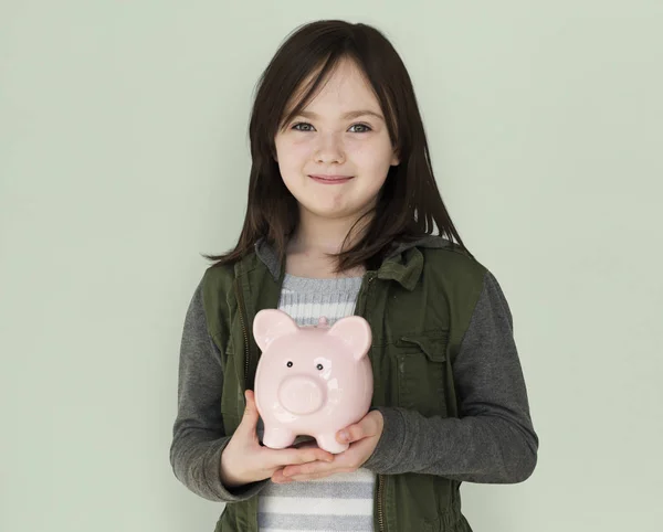 Meisje bedrijf piggy bank — Stockfoto