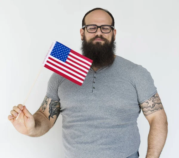 Hombre sosteniendo bandera — Foto de Stock