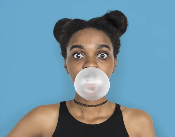Girl blowing bubble gum — Stock Photo, Image