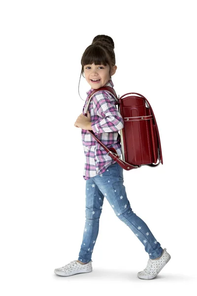 Маленька мила дівчинка з сумкою — стокове фото