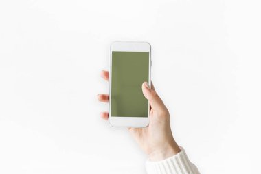 El ele tutuşan cep telefonu