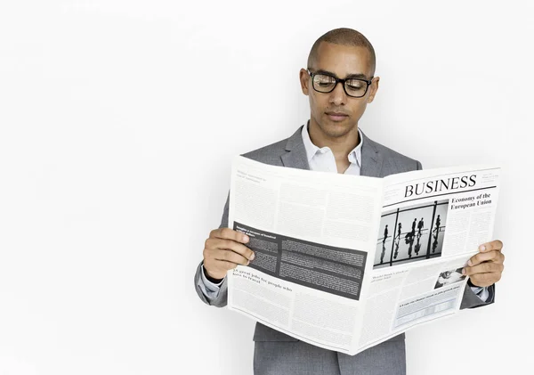 Young Businessman reading newspaper — Stock Photo, Image