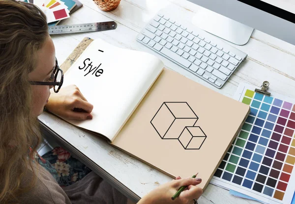 Designer drawing in album — Stock Photo, Image