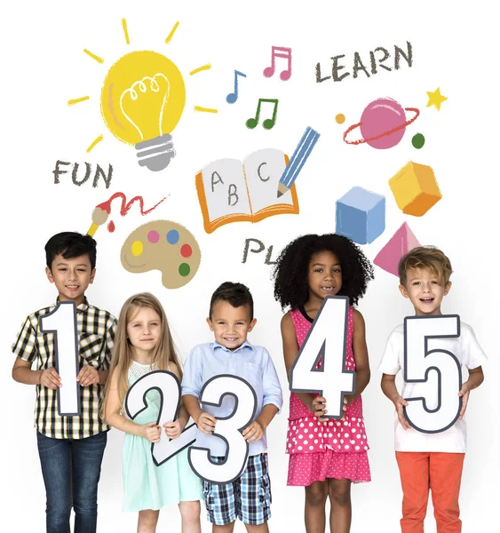 Children holding paper numbers — Stock Photo, Image