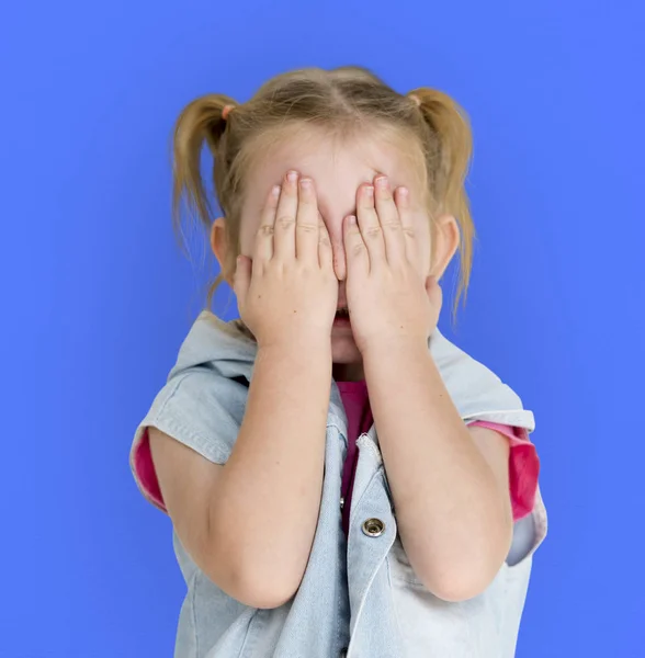 Cute little girl covering face — Stock Photo, Image