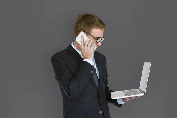 Adult businessman with laptop — Stock Photo, Image