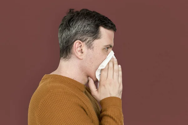 Man Sneezing in Napkin — Stock Photo, Image