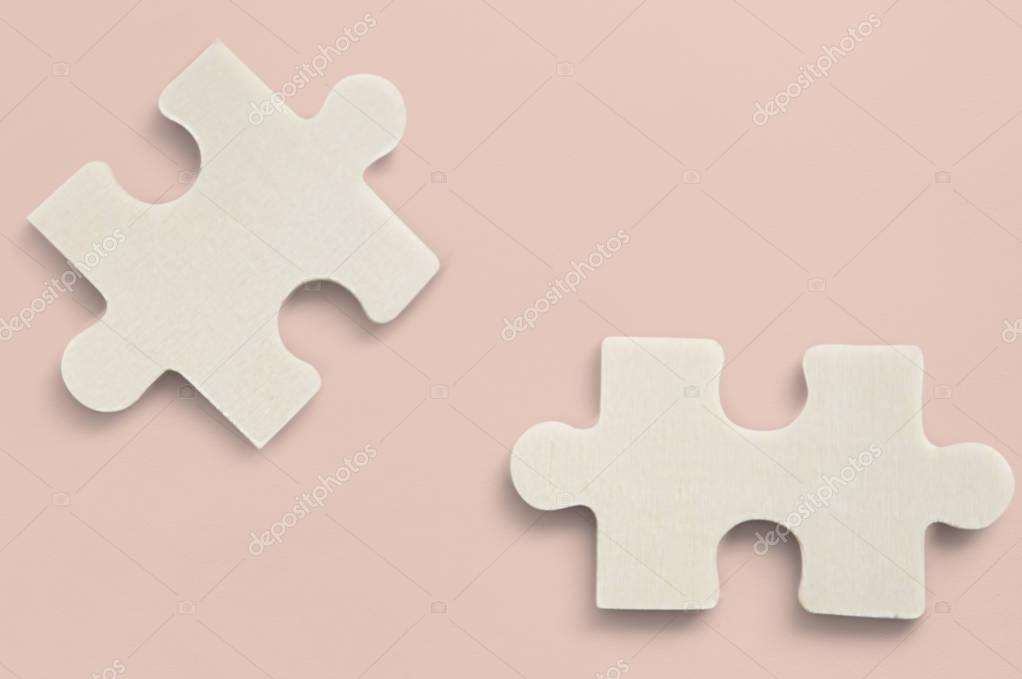 Two pieces of jigsaw puzzle, studio shot, game concept, original photoset