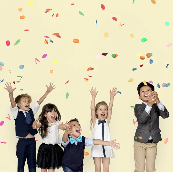 Children Celebrating with confetti — Stock Photo, Image