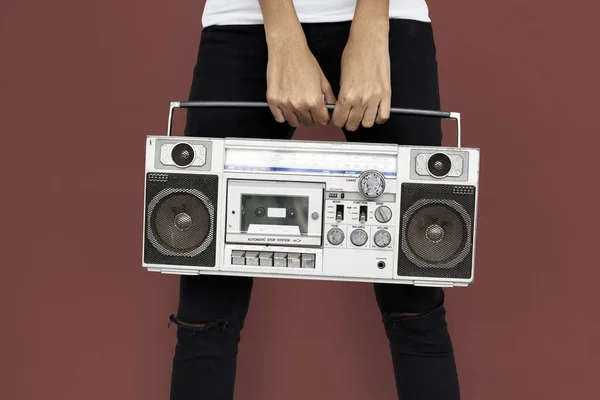 Woman holding radio — Stock Photo, Image