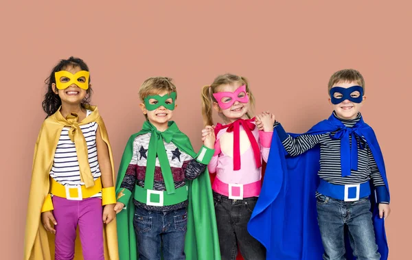 Niños felices en trajes de superhéroe — Foto de Stock