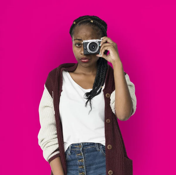 Woman taking pictures on photo camera — Stock Photo, Image