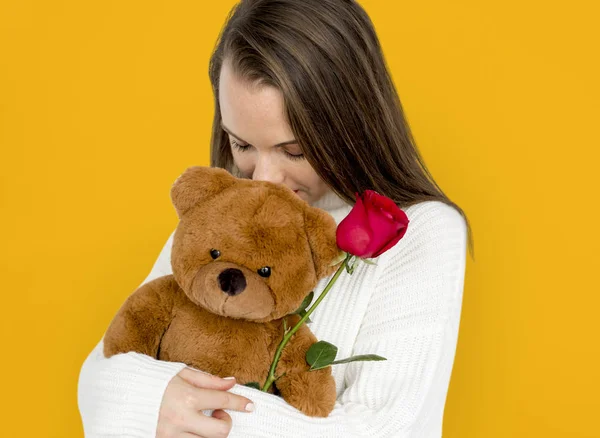 woman Hugging Teddy bear