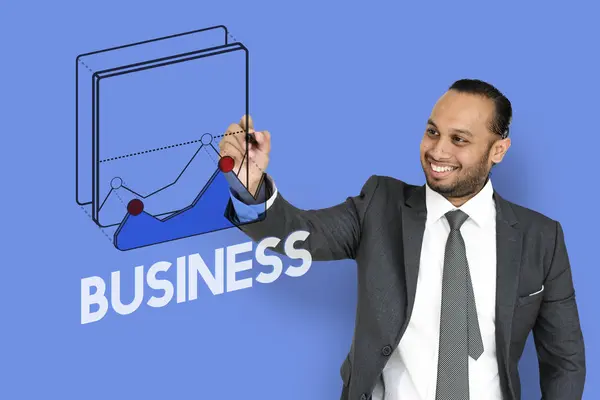 Businessman holding pen and writing — Stock Photo, Image