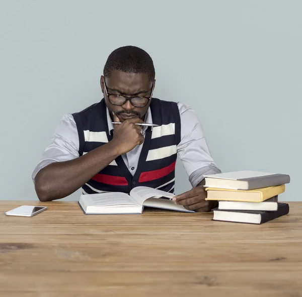 Black ethnicity man reading books — Stock Photo, Image