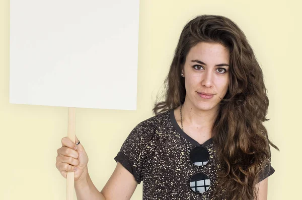 Caucasian woman holding protest placard — Stock Photo, Image