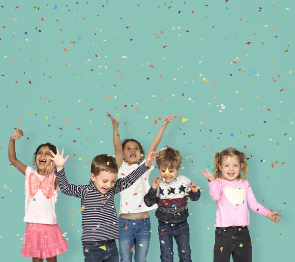 Niños adorables saltando en el estudio —  Fotos de Stock