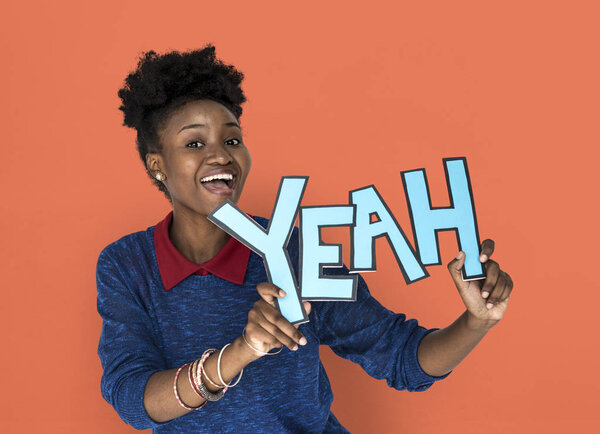 Woman Holding Yeah Word