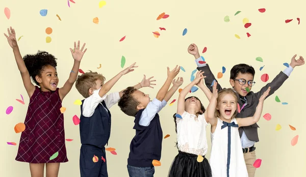 Children Celebrating with confetti — Stock Photo, Image