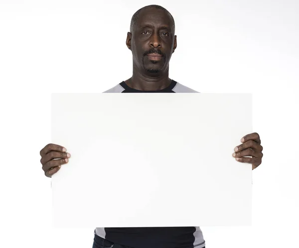 Homem Africano segurando bandeira vazia — Fotografia de Stock