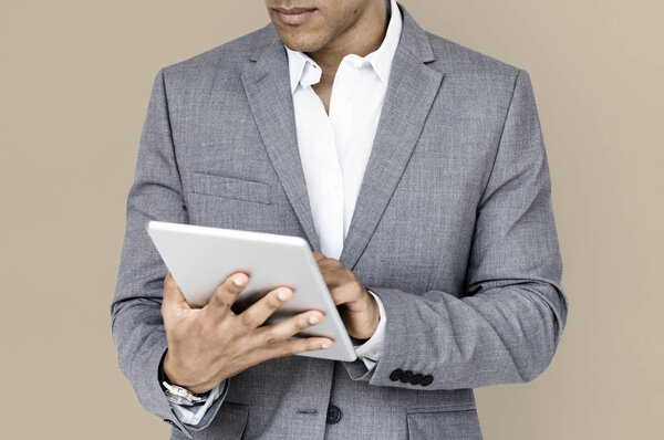 Businessman browsing digital tablet