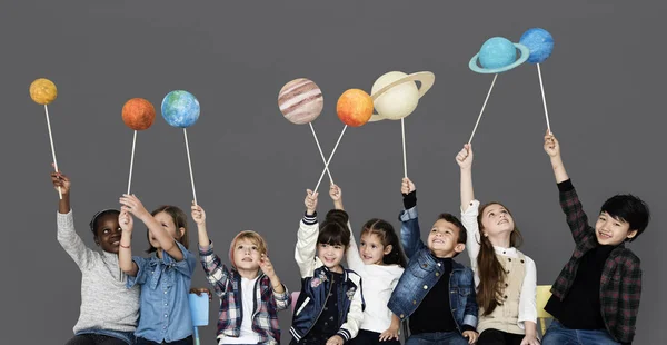 Gyermekek gazdaság Naprendszer — Stock Fotó
