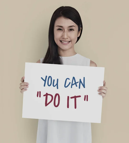 Young woman holding banner. — Stock Photo, Image