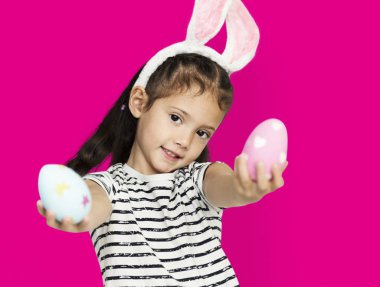 cute little girl with easter eggs