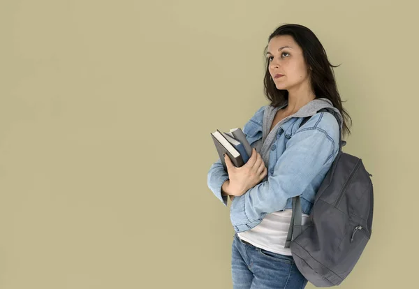 Estudiante con mochila sosteniendo libros — Foto de Stock