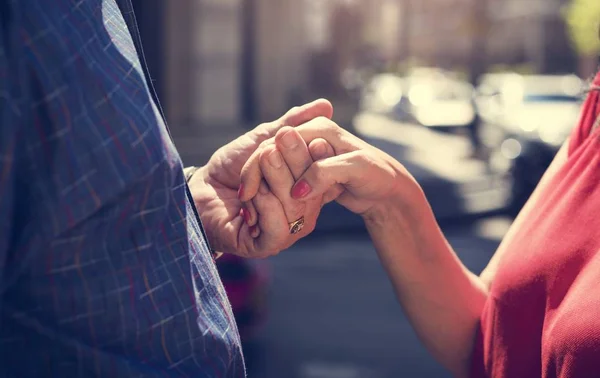 People holding hands — Stock Photo, Image