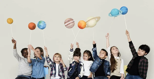 Children Holding solar system — Stock Photo, Image