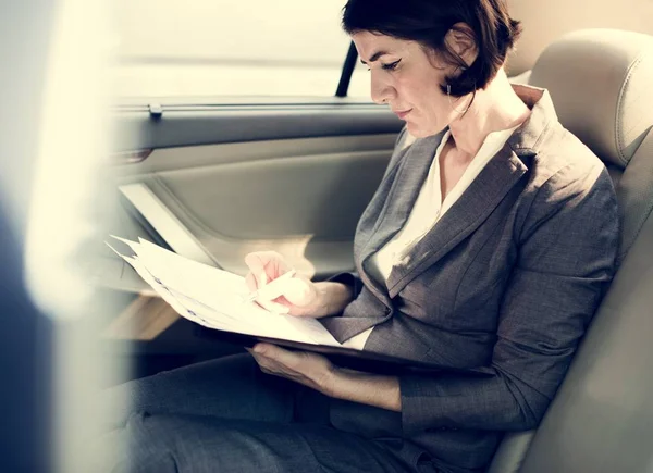 Professional businesswoman in car — Stock Photo, Image