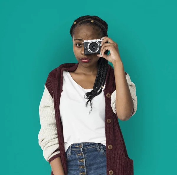 Woman taking pictures on photo camera — Stock Photo, Image
