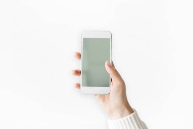 El ele tutuşan cep telefonu