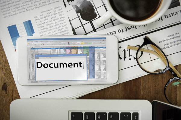 smartphone, newspaper and coffee on table