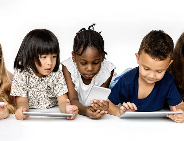 children using digital devices