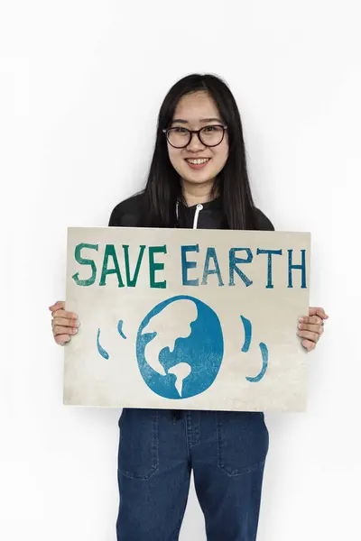 Asian woman holds placard — Stock Photo, Image