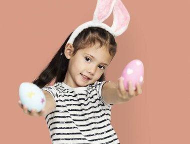 cute little girl with easter eggs