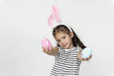 cute little girl with easter eggs