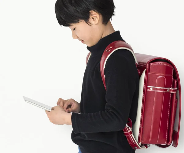 Ásia menino usando digital tablet — Fotografia de Stock