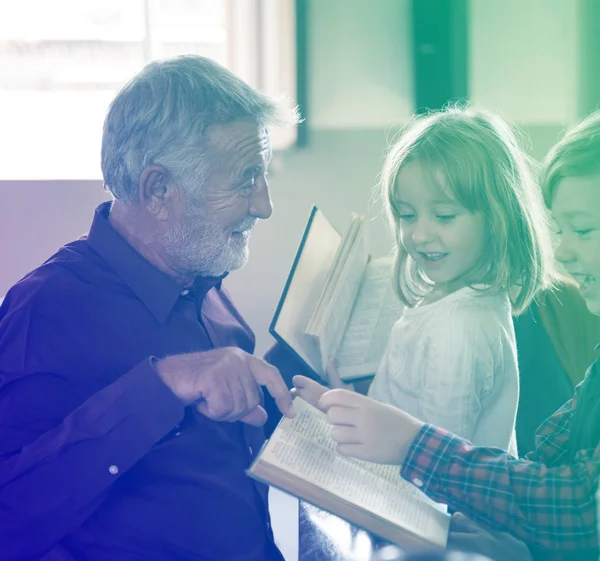 Priest Showing Bible to Kids — Stock Photo, Image