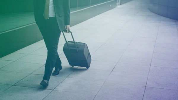 Businessman with luggage on way to travel