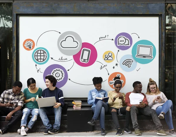 Young students siting near placard — Stock Photo, Image